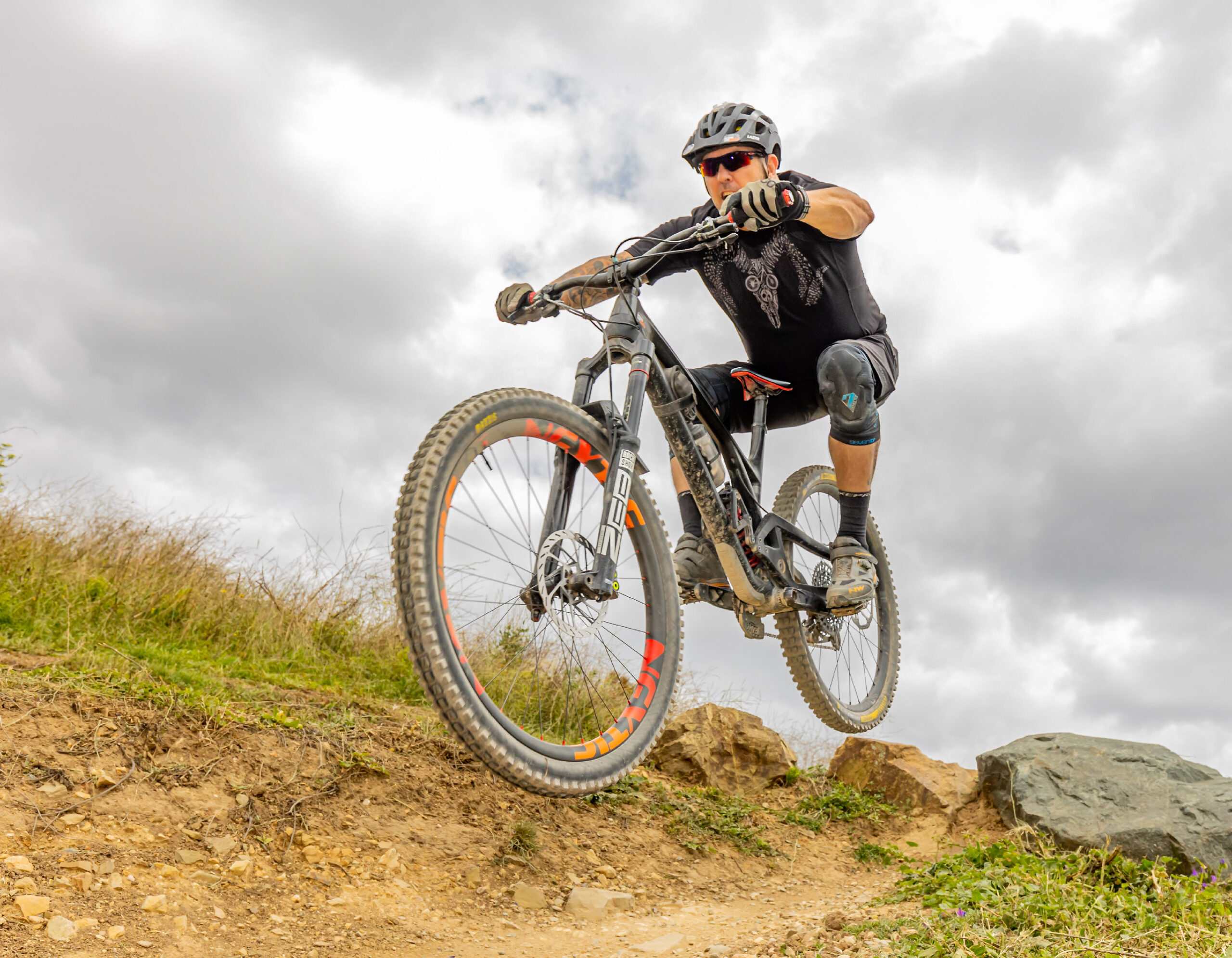 A Mountain bike rider in mid air